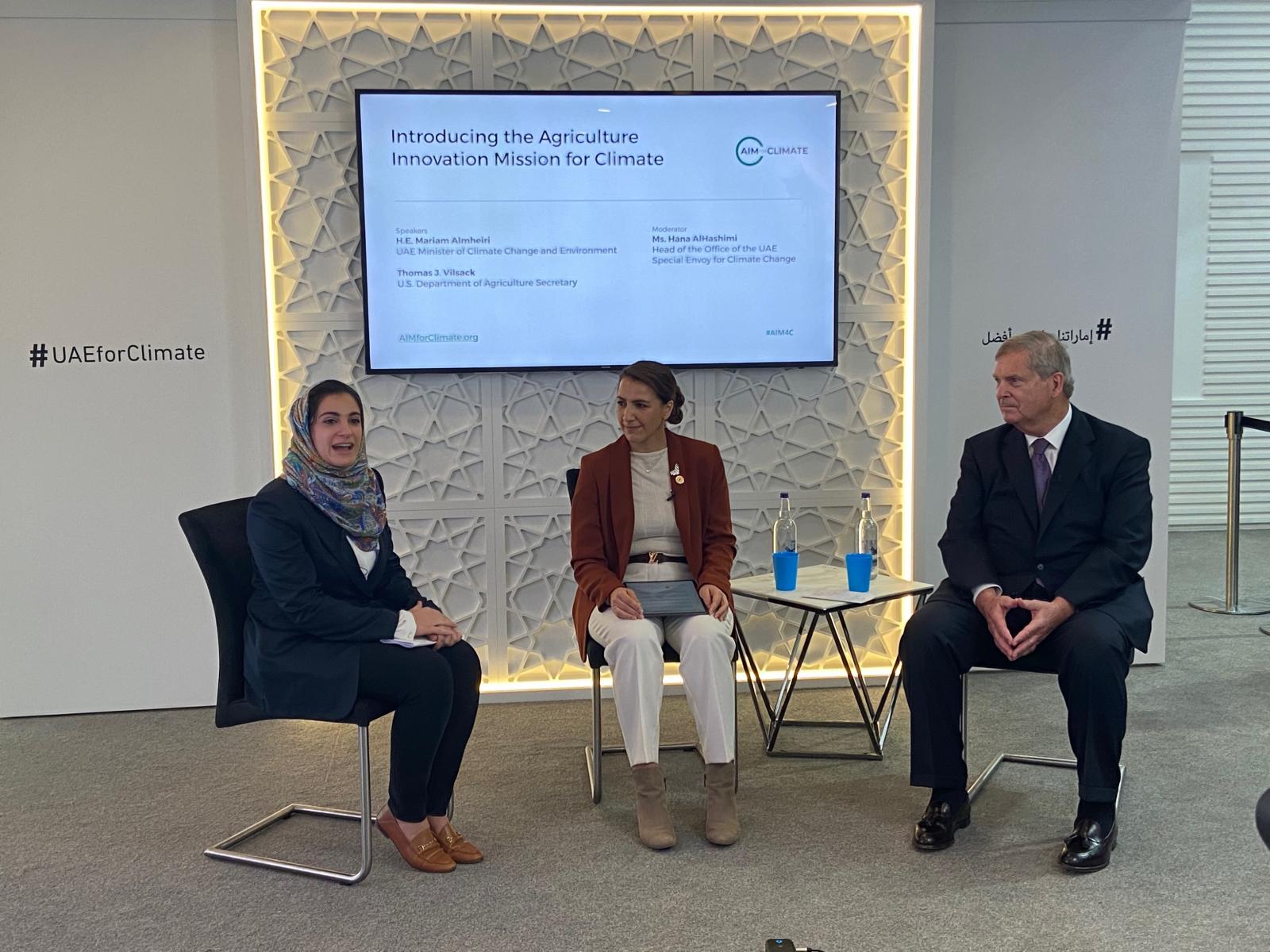 Secretary Vilsack seated having discussion with UAE officials at COP26 in Glasgow..