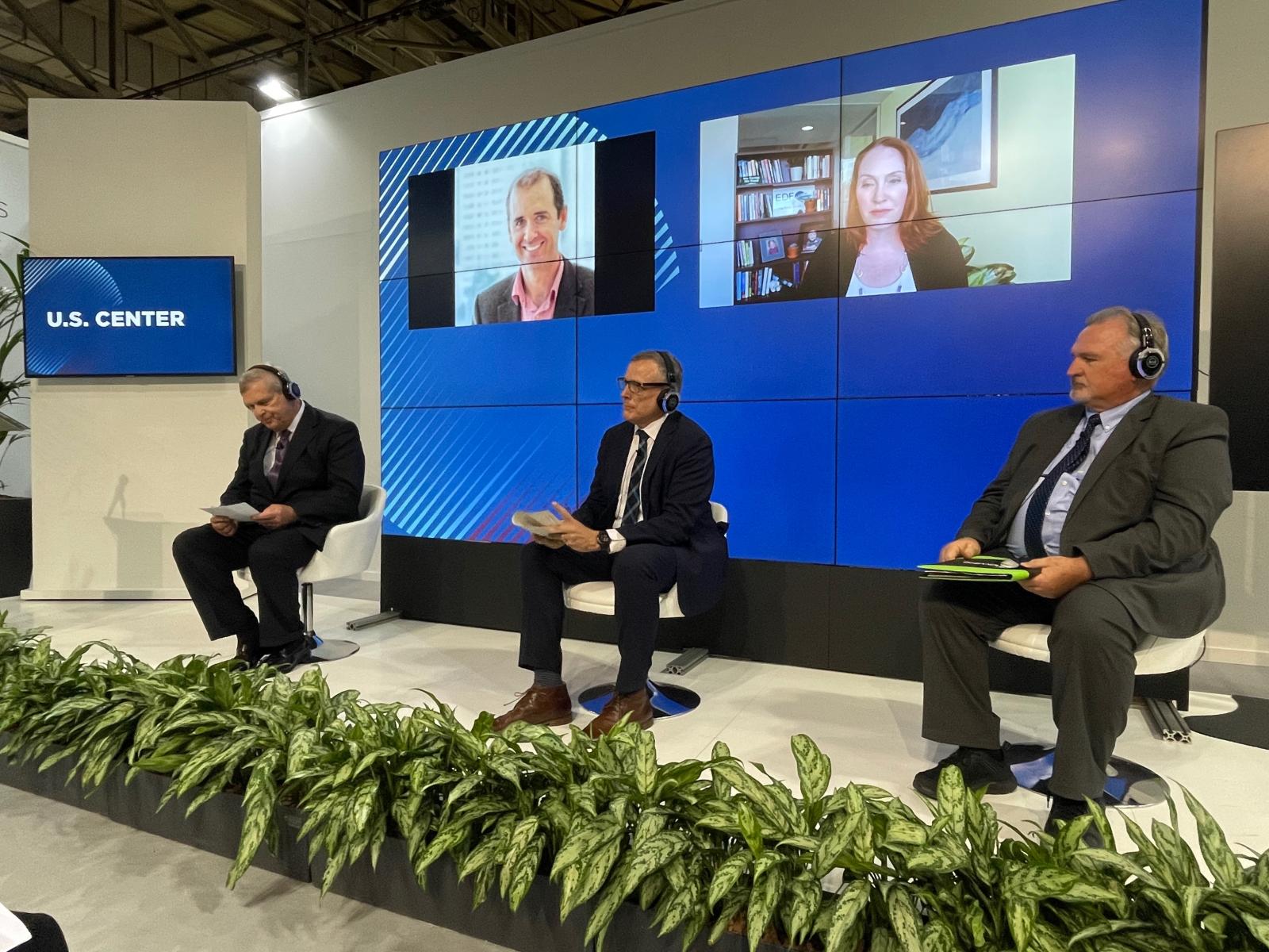 Secretary Vilsack with in-person and on-screen panelists at COP26