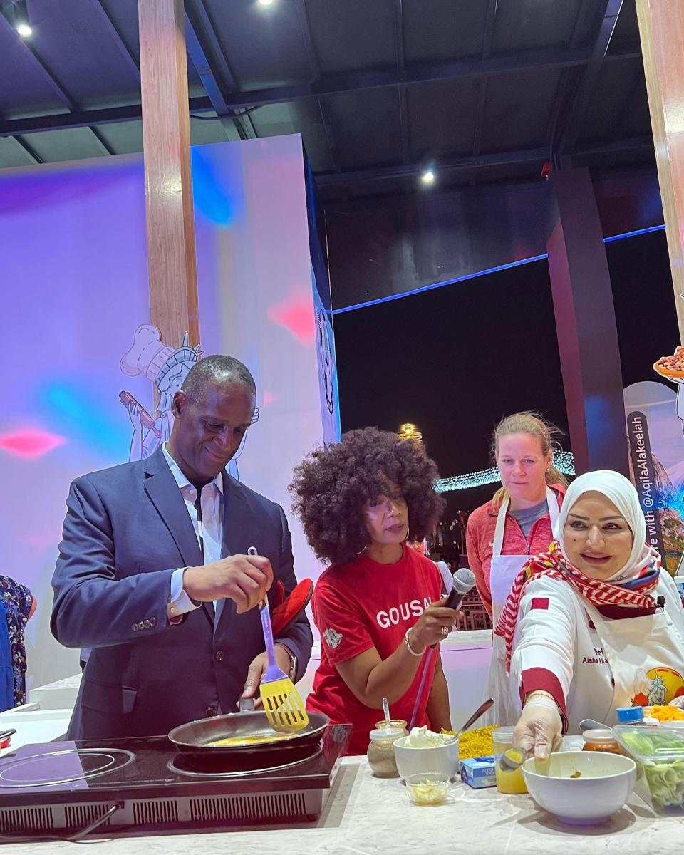 U.S. Ambassador to Qatar Timmy Davis, USDA Agricultural Counselor Valerie Brown, and U.S. Soccer President Cindy Parlow Cone join Qatari Celebrity Chef Aisha Al Tamimi at the USA Pavilion.