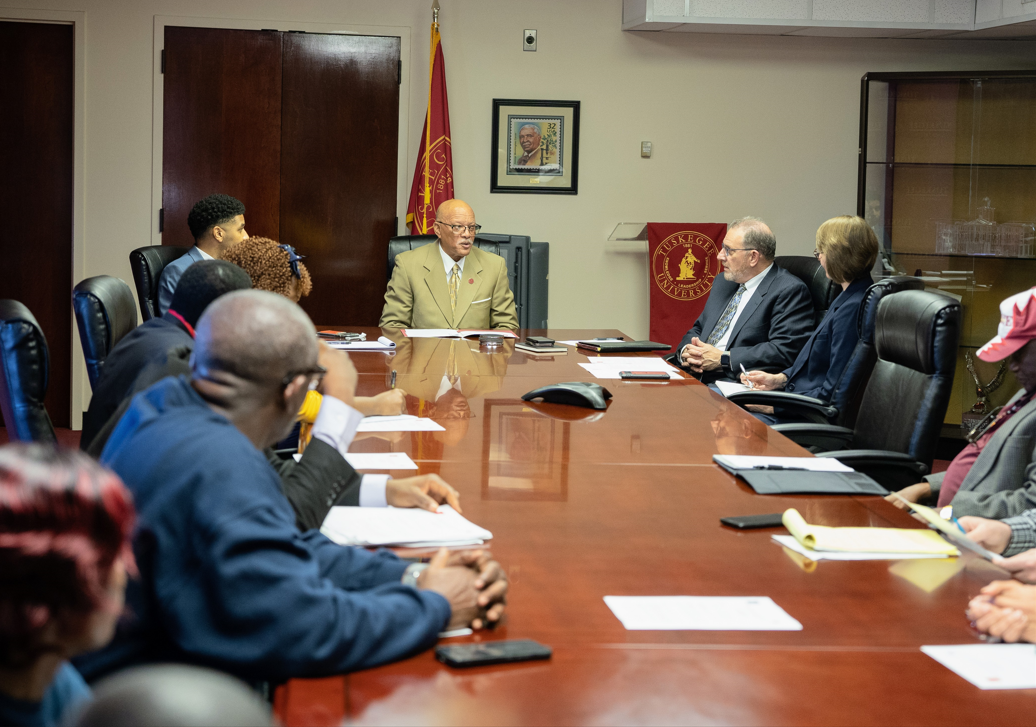  FAS staff meet with Tuskegee University Board of Trustee Member Dr. Douglas Chambers to discuss the mutual benefits the program has provided to both the Tuskegee and visiting faculties. 