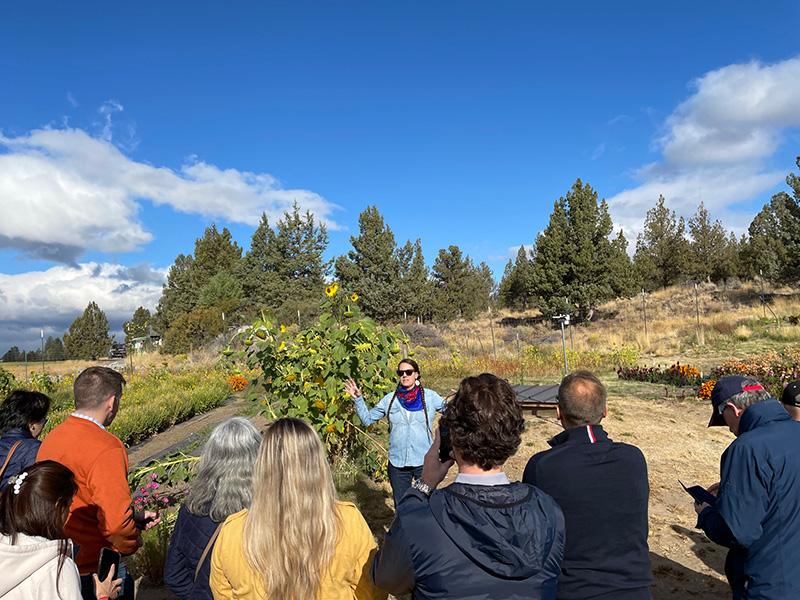 The attachés visited Sakari Farms in Bend, Oregon, which focuses on on-farm Technical Assistance through classes & implement research based tribal seed production, contract & wholesale growing.